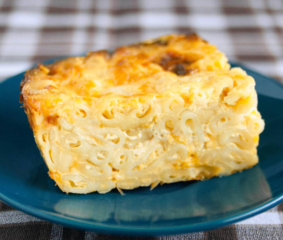 Caribbean-style baked macaroni, with a rich creamy cheese sauce topped with bread crumbs